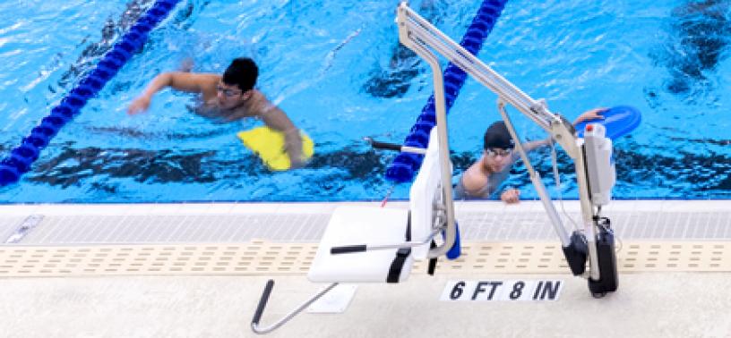 Swimmers near the Wheelchair lift into the lap pool