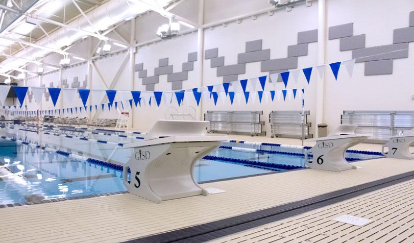 A side view of the diving platforms next to the lap pool