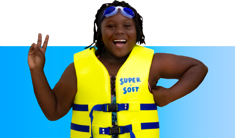 Smiling water safety kid in a lifejacket and goggles